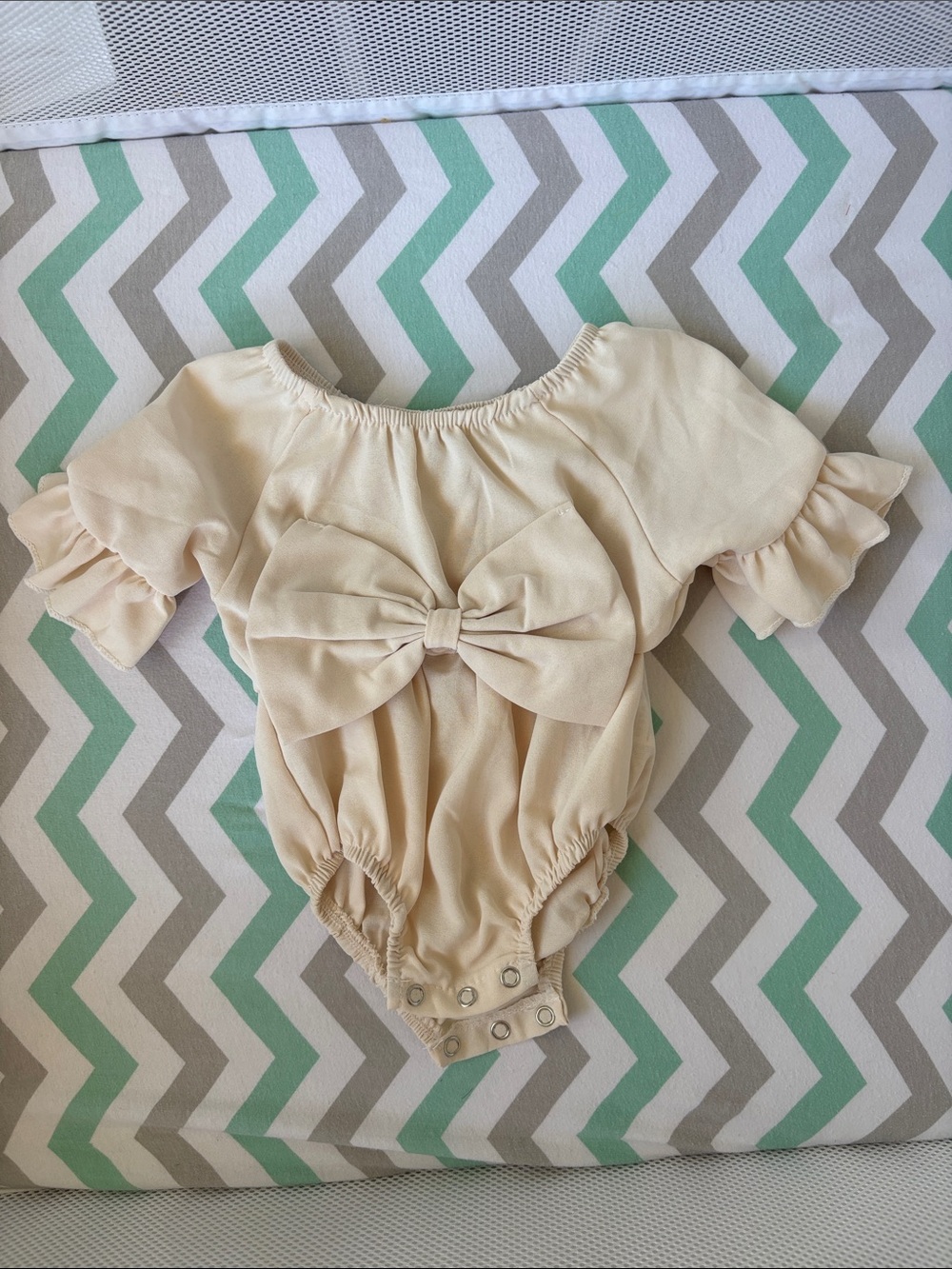 Cream Bow-Front Baby One-Piece Bodysuit